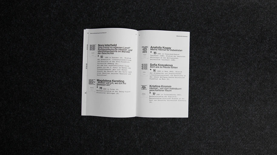 Author index spread listing contributors with QR-style markers and biographical notes.